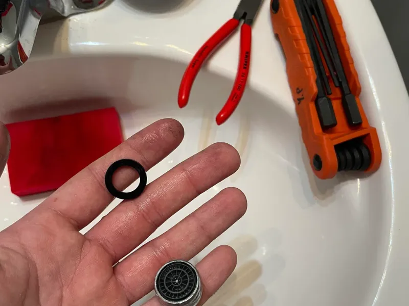 New WaterSense faucet and aerator being installed in a San Diego kitchen